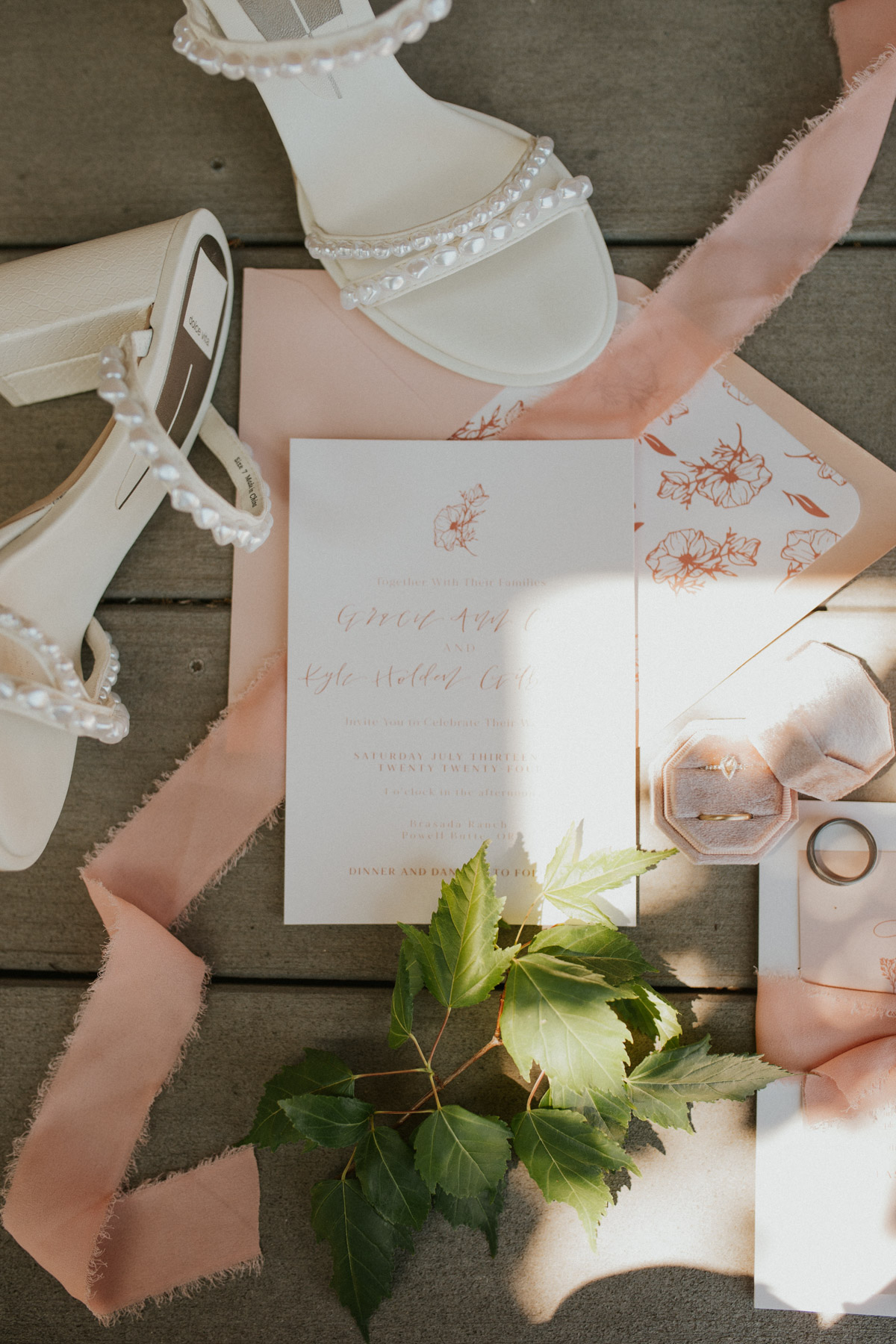 A flatylay of a wedding invitation suite by Life in Letters
